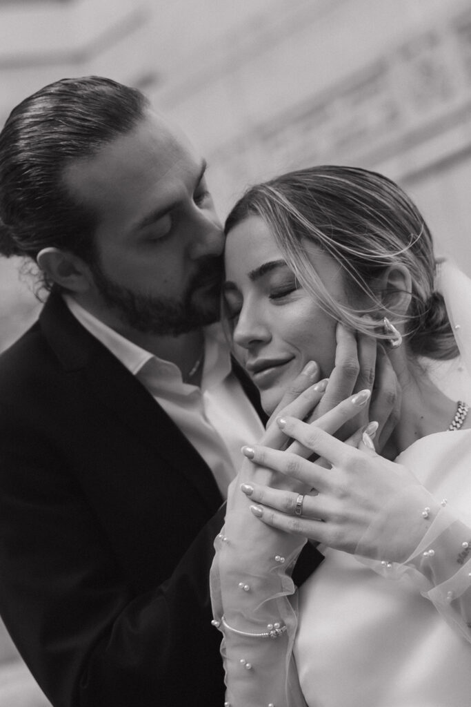 Couple in a romantic pose during their elopement, capturing the essence of their love against a beautiful NYC backdrop