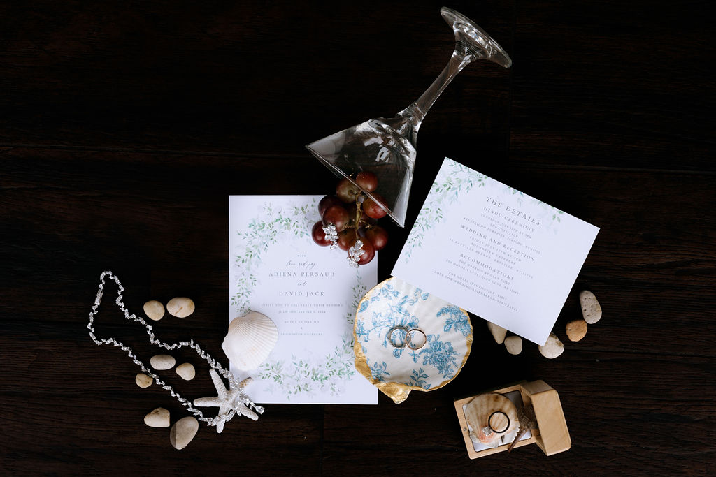 Elegant wedding invitation, jewelry, and rings creatively styled, showcasing luxury details for a romantic, intimate wedding
