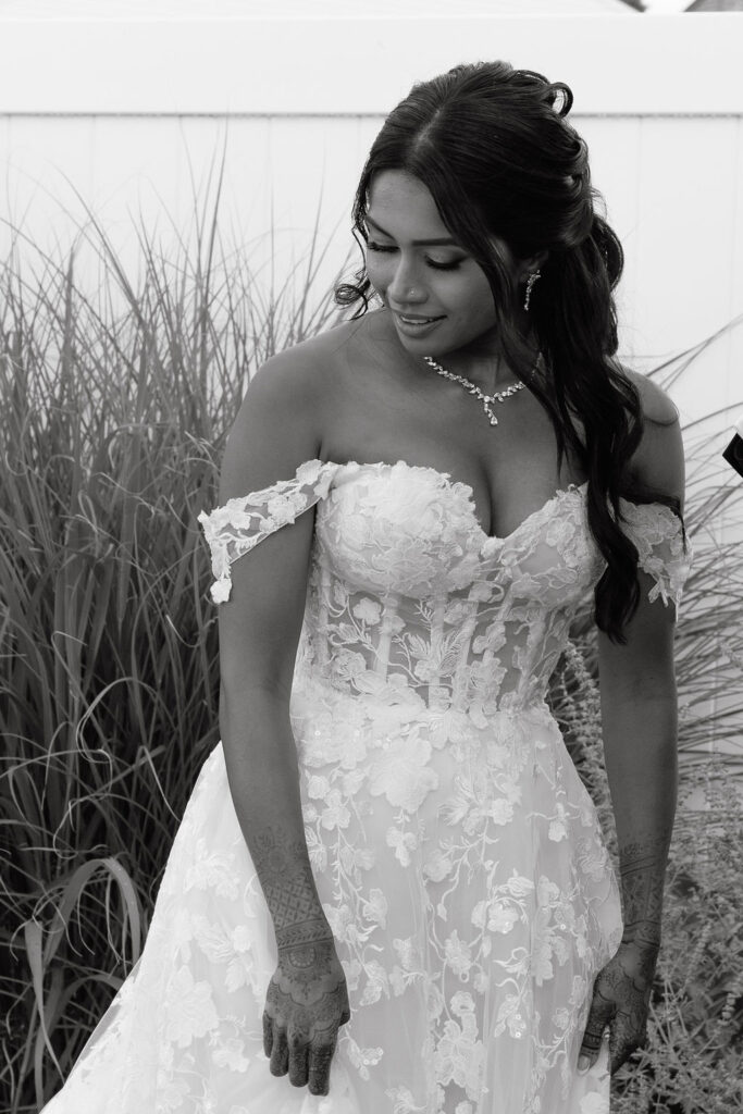 Joyful bride getting ready for her intimate wedding, captured in a candid, documentary-style moment, showcasing elegance and anticipation.
