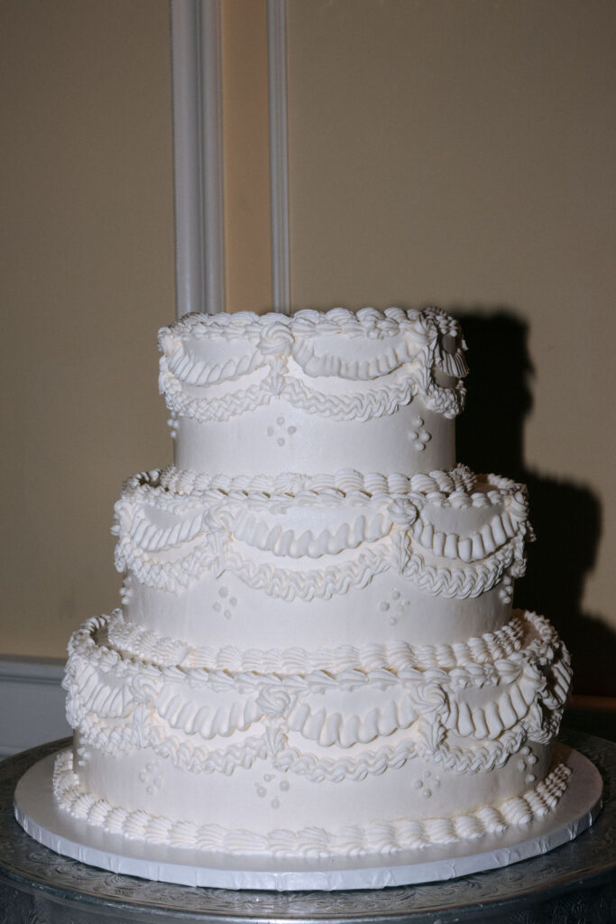 Elegant vintage wedding cake with intricate details, capturing a classic and timeless design for the celebration.