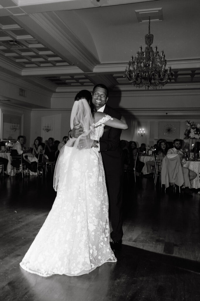 Bride sharing a heartfelt dance with her father, capturing a touching moment filled with love and emotion during the wedding celebration