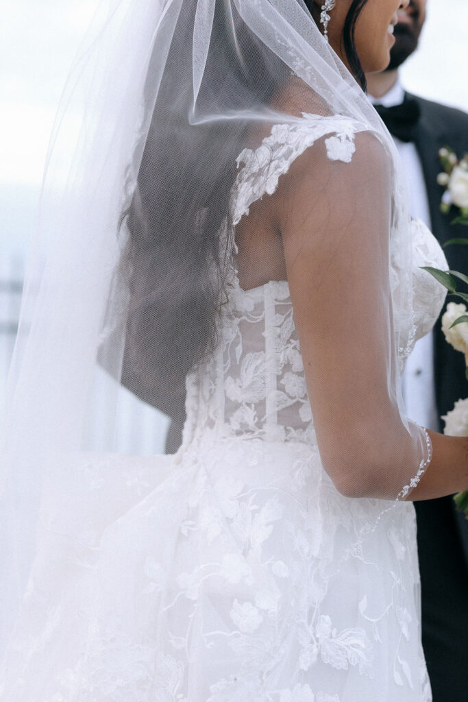 Elegant bridal veil flowing gracefully, adding a romantic touch to the bride's look on her wedding day