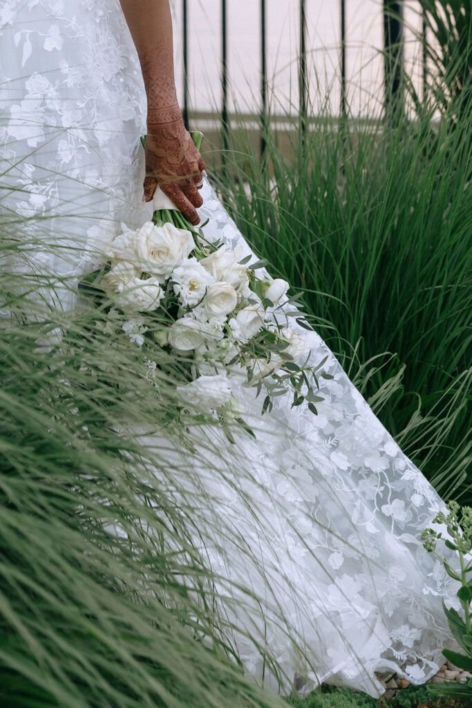 Beautiful arrangement of vibrant flowers and lush greenery, enhancing the romantic ambiance of the wedding decor