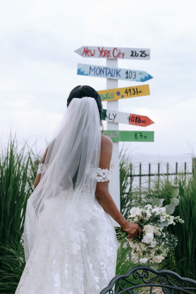 Elegant bridal veil cascading softly, adding a romantic touch to the bride's wedding day look.