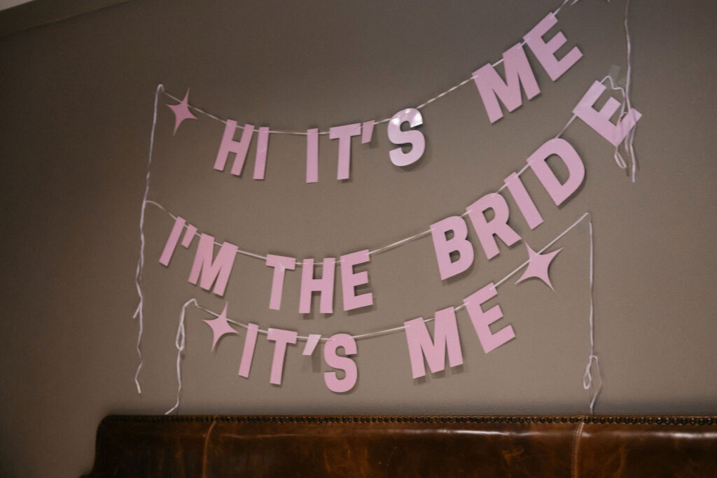 Wedding reception sign reading “Hi it’s me, I’m the bride” during an intimate SoHo wedding in New York City