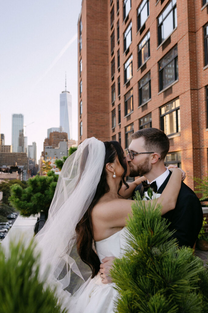 Bride and groom sharing a quiet moment surrounded by greenery during a SoHo wedding in New York City