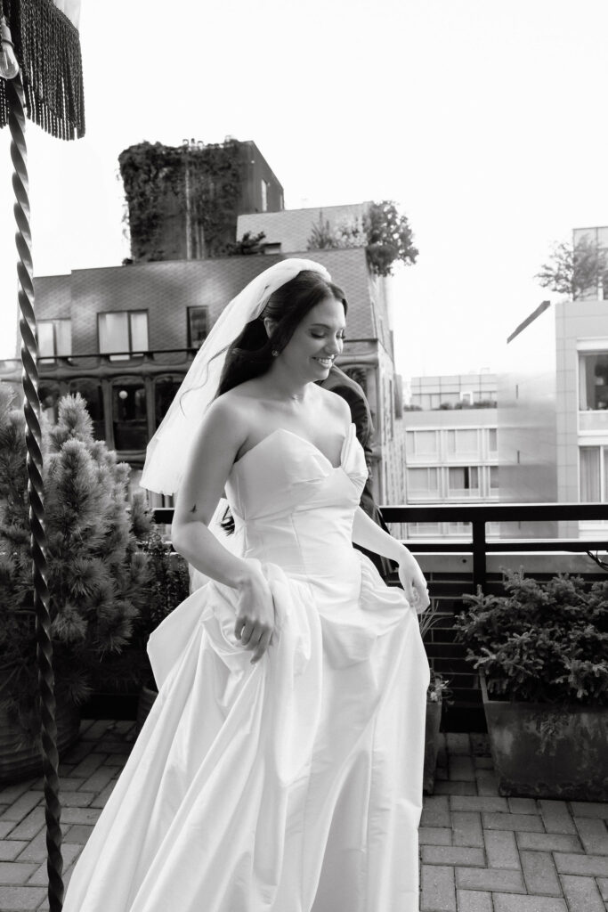 Bride standing alone in her wedding dress during an intimate SoHo wedding in New York City