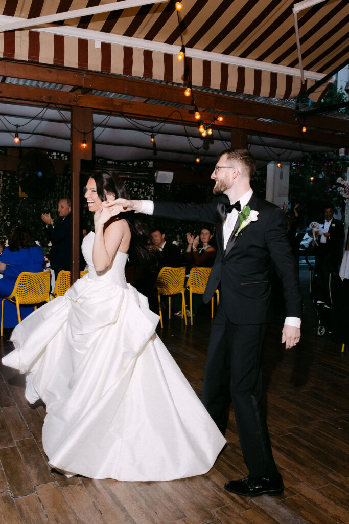 Bride and groom dancing together on the dance floor during an intimate wedding reception in SoHo, New York City.