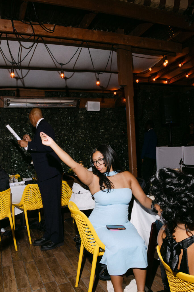 Wedding guests dancing and celebrating during a lively wedding reception in SoHo, New York City.