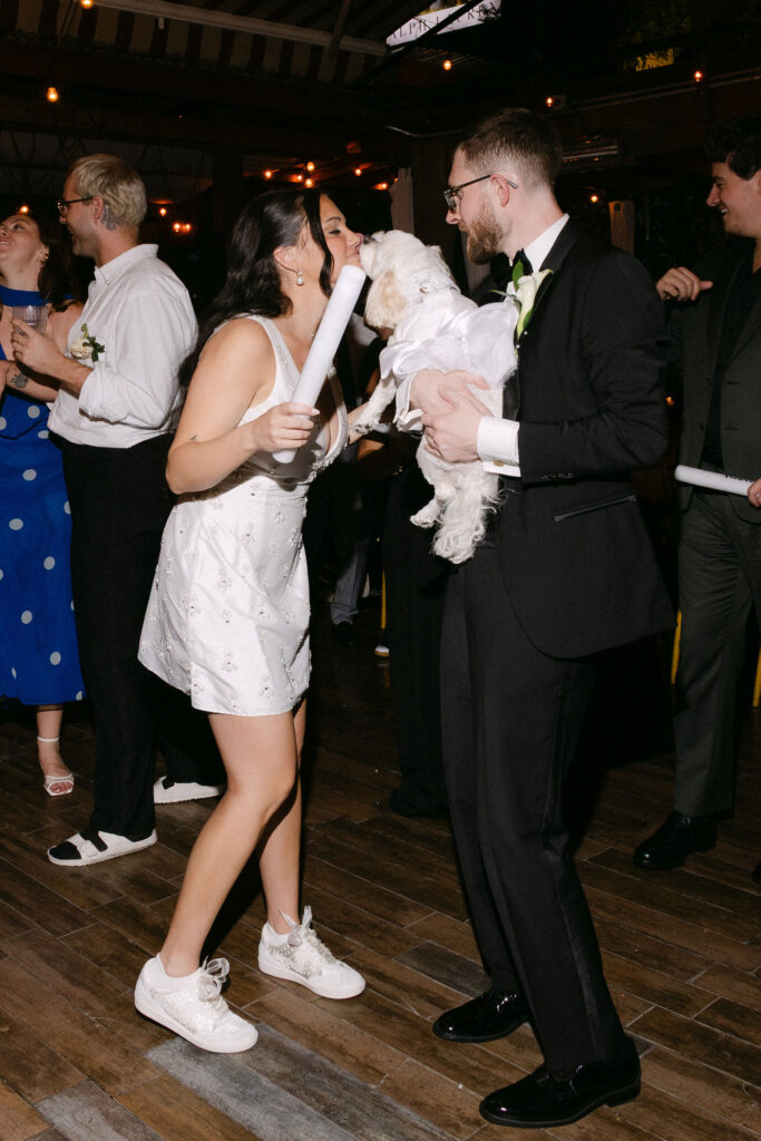 Bride dancing and celebrating on the dance floor during a lively wedding reception in SoHo, New York City.