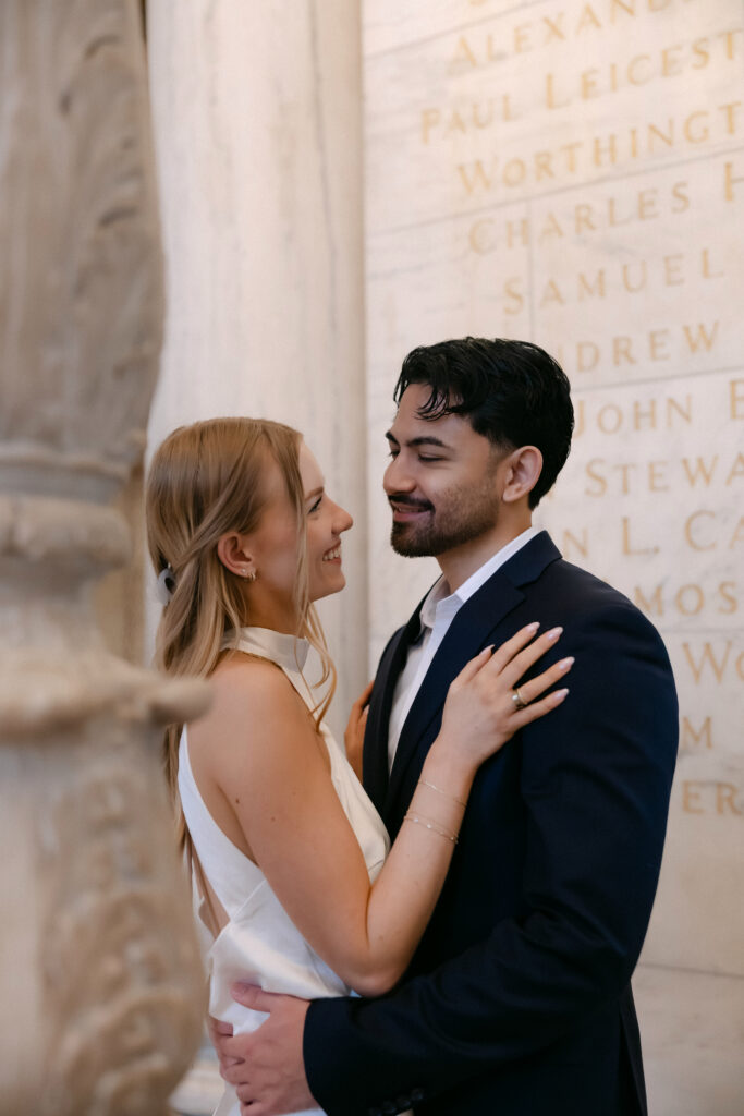 Romantic couple portrait inside New York Public Library during NYC engagement photos