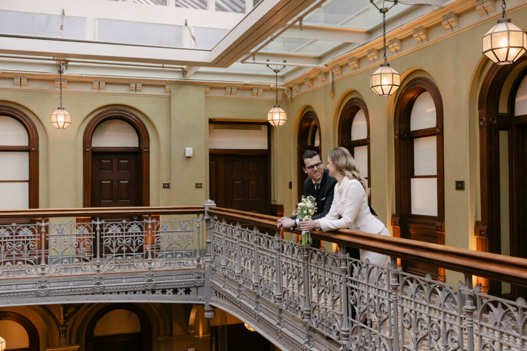 editorial couple portrait inside beekman hotel atrium nyc elopement before city hall