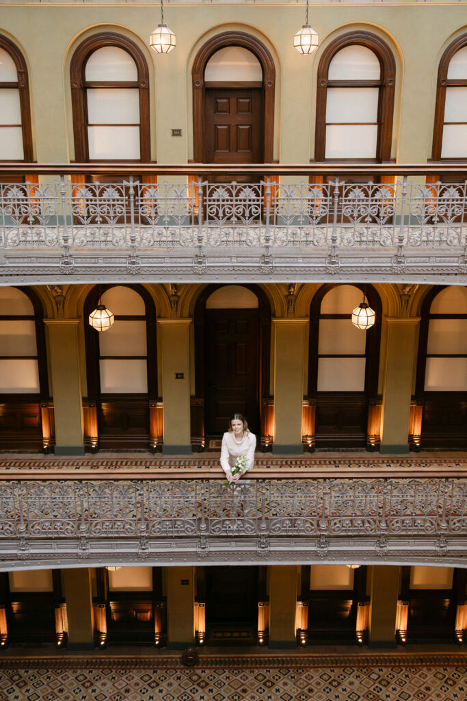 wide symmetrical couple portrait beekman hotel nyc wedding elopement before city hall