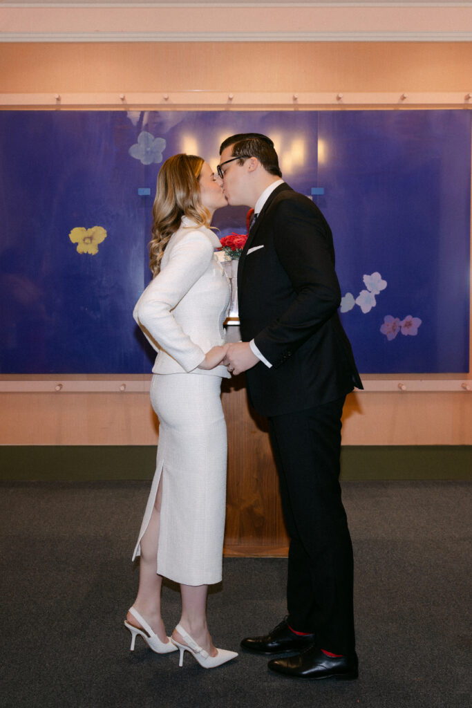 nyc city hall wedding ceremony kiss just married elopement moment